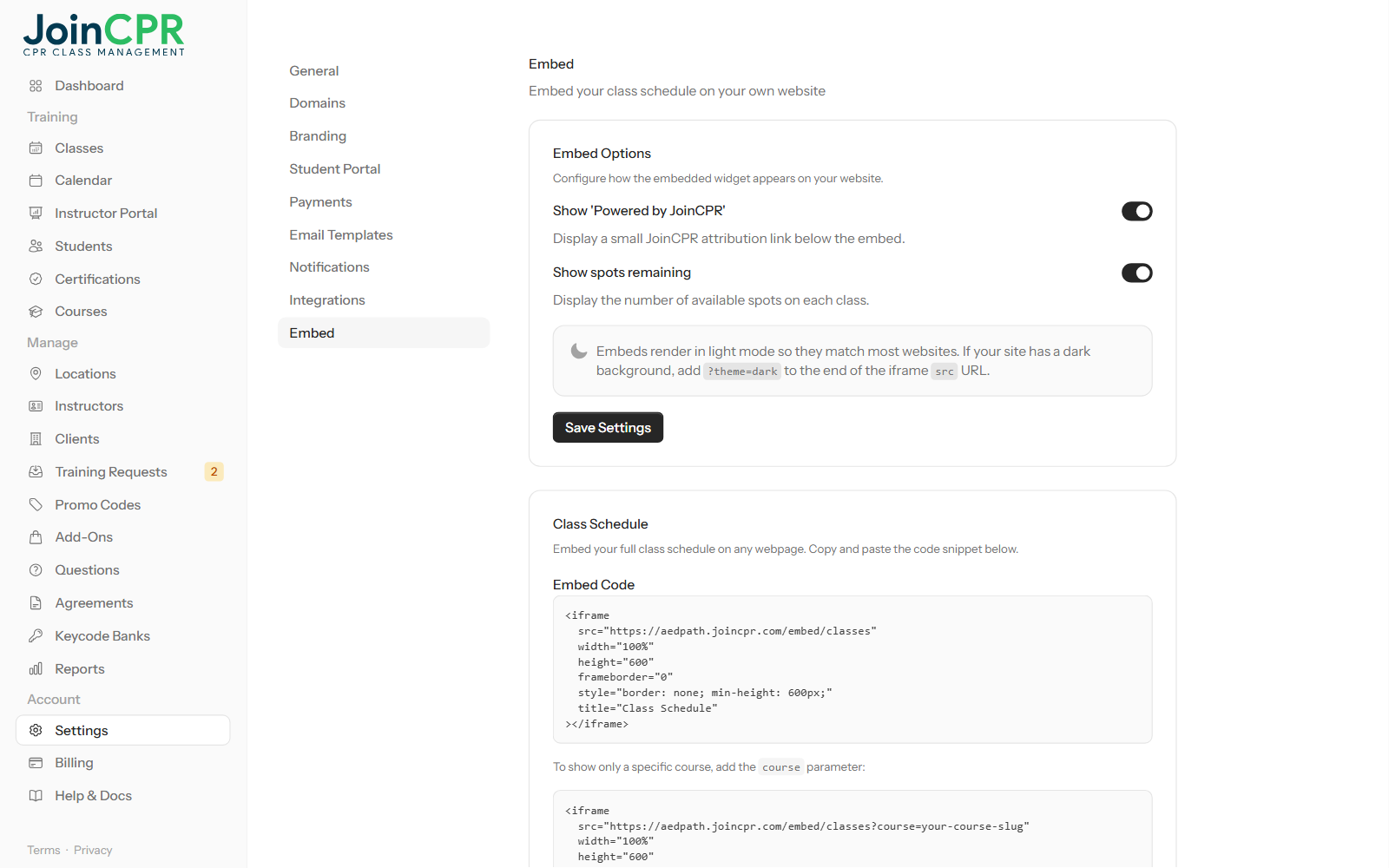 The Embed settings page in JoinCPR with switches for Powered by JoinCPR and spots remaining, a note about the dark theme, and the class schedule embed code to copy